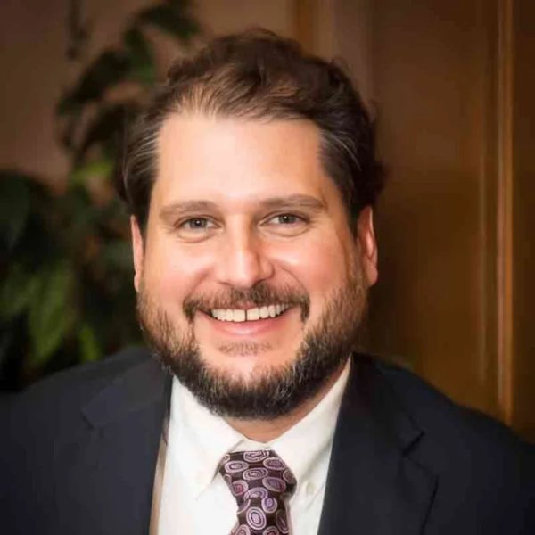 Greg S. Collins